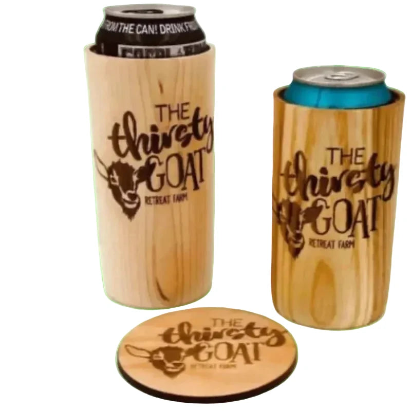 Wooden can coolers and coaster with 'The Thirsty Goat Retreat Farm' branding on a white background.
