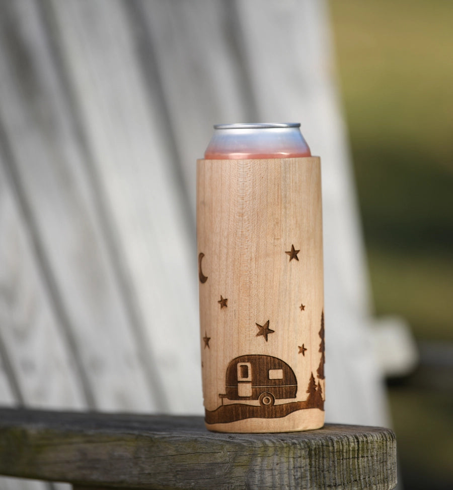 Treesleeve engraved with teardrop camper sitting outside
